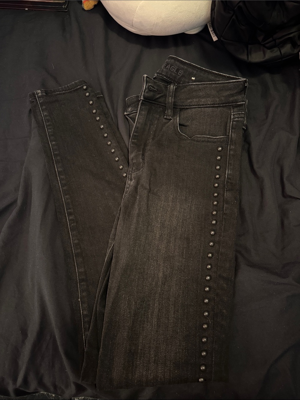 Black hi rise jeggings with studs on the side